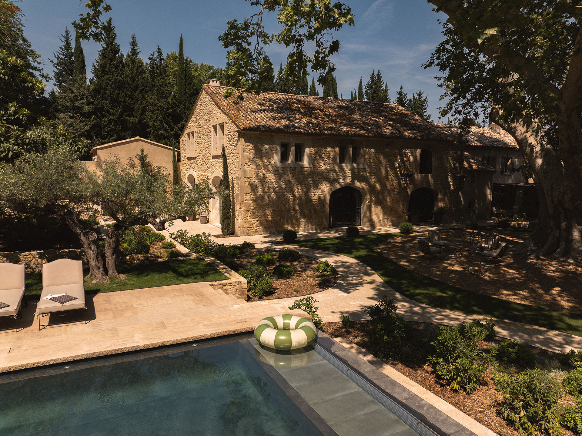 Le Mas de Castillone in Provence with elegant stone architecture and green surroundings