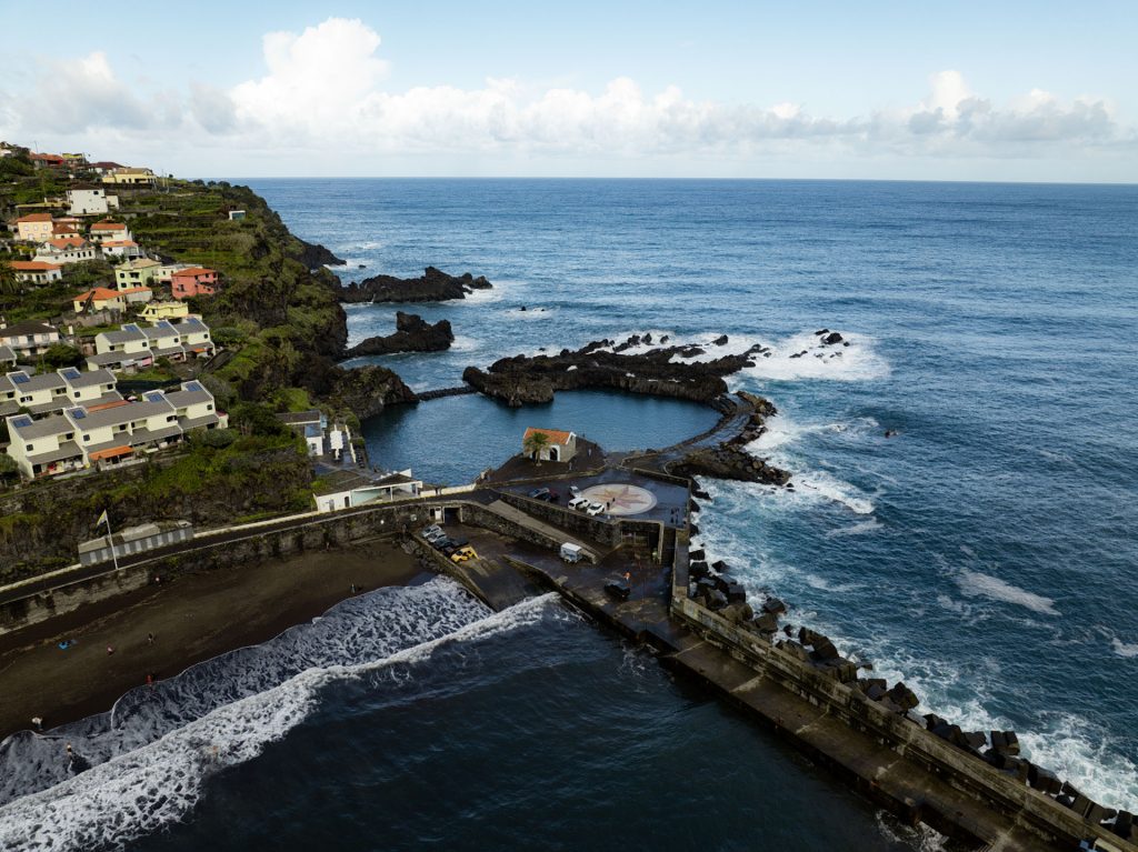 Seixal beach with black volcanic sand in Madeira.